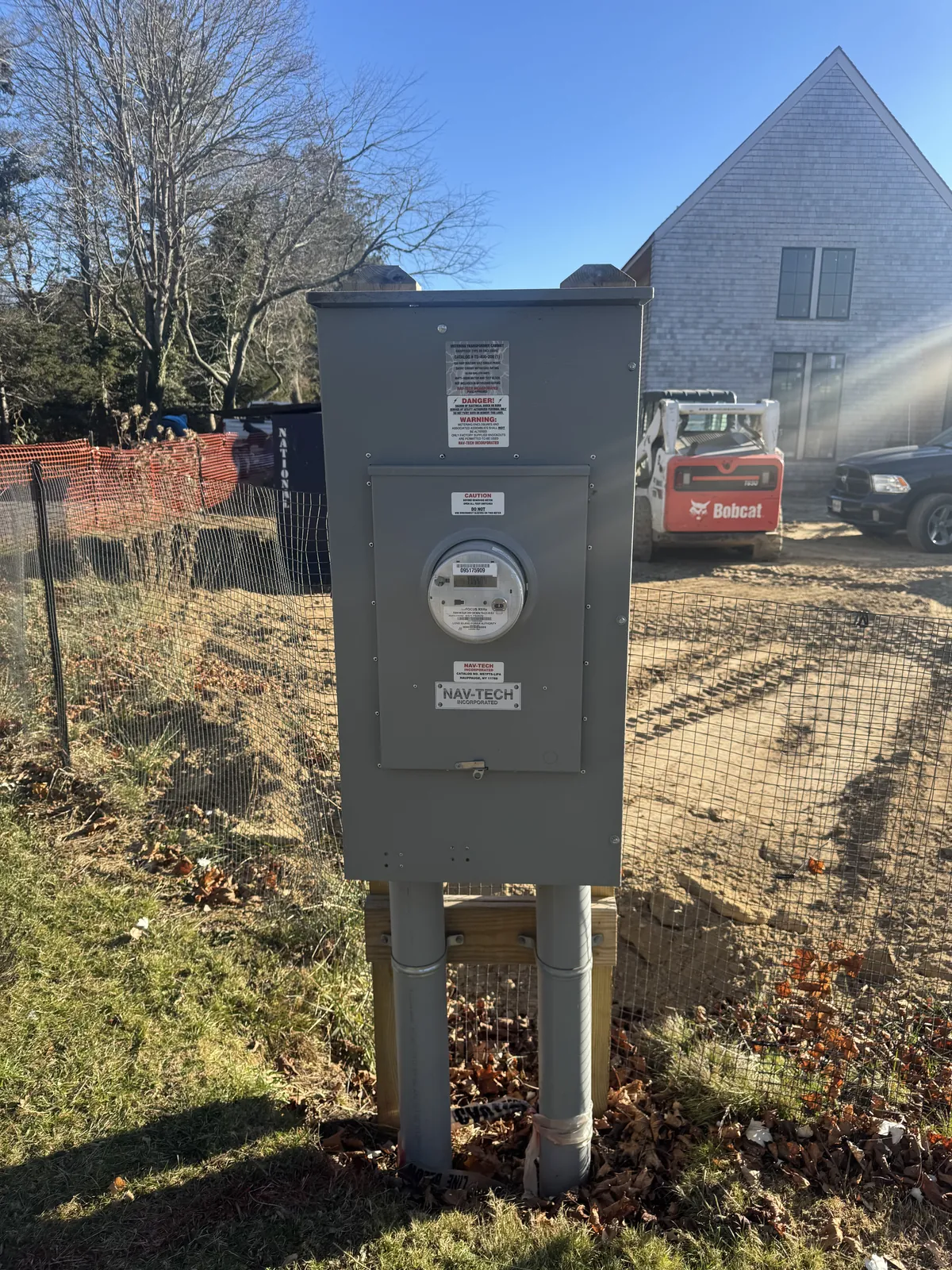 New electrical service meter and disconnect installed at a new construction home